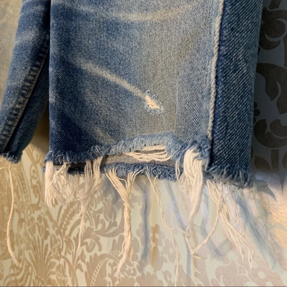 Levi's Faded Blue Distressed Denim Cutoff Shorts